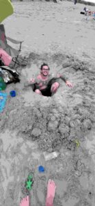 beachgoer-digging-holes-on-beach