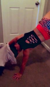 woman-performing-the-handstand-challenge