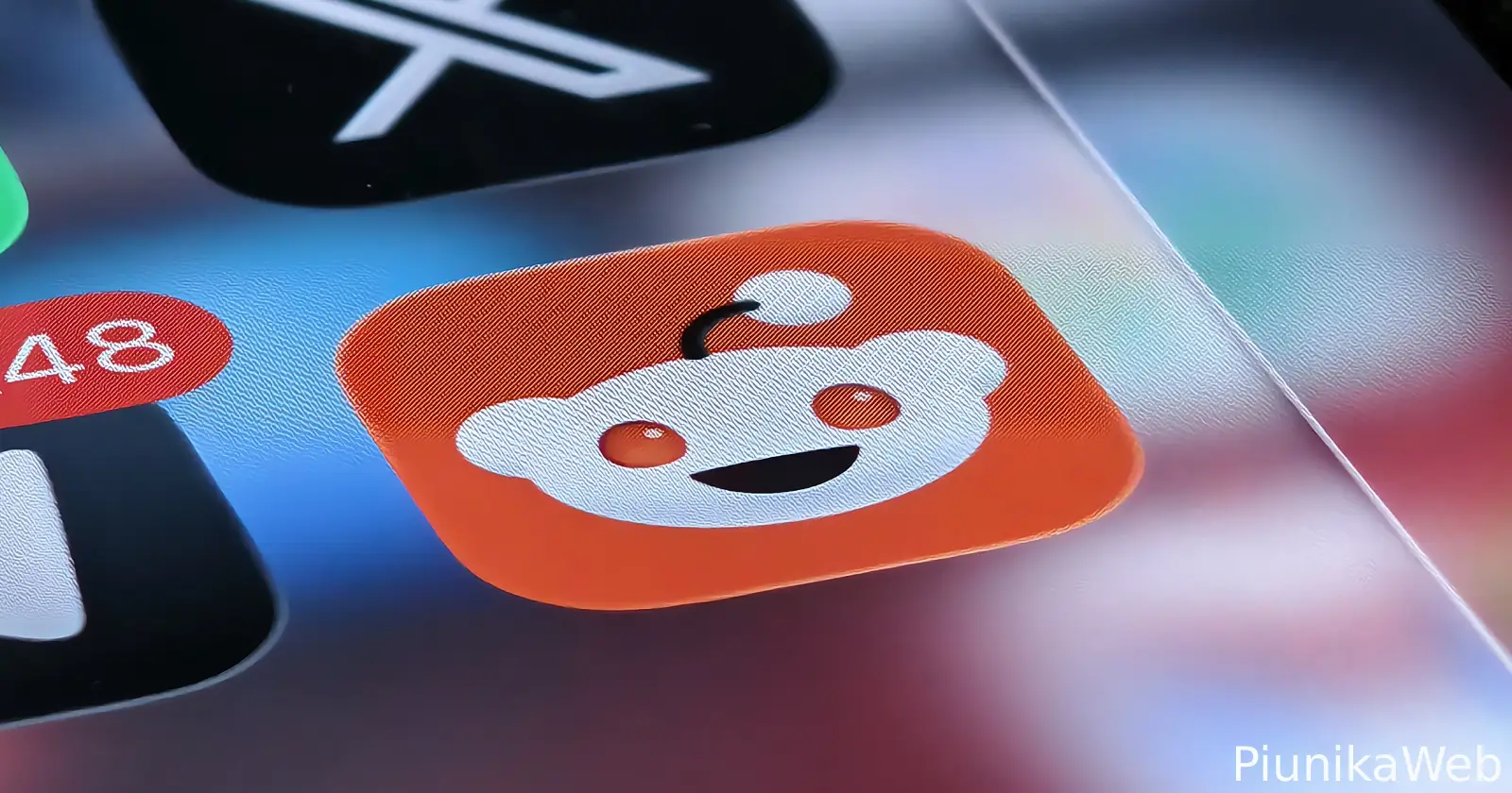 Reddit's Liquid Glass UI makeover is rolling out widely for iOS - PiunikaWeb
